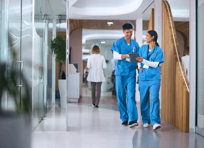 male-and-female-doctors-or-nurses-in-scrubs-with-d-2024-03-05-23-04-57-utc-1024×819