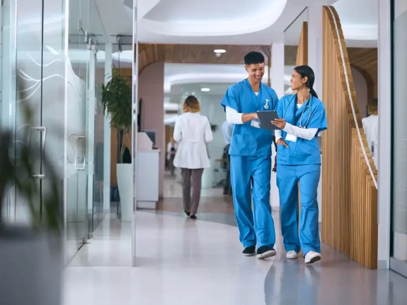 male-and-female-doctors-or-nurses-in-scrubs-with-d-2024-03-05-23-04-57-utc-1024×819